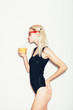© Kaponia Aliaksei - Summer blonde woman in sunglasses with cocktail