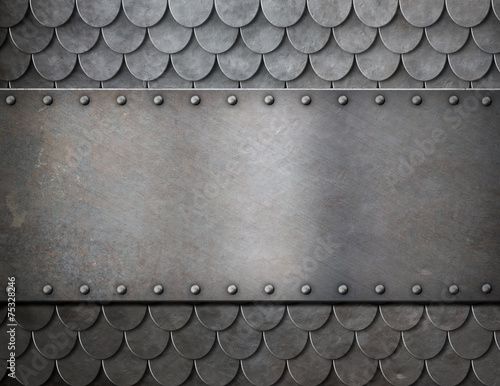 Fotografía metal plate over scales armor background
