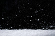 © Linett - Snow on black background