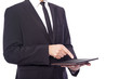 © cristovao31 - Business man using a tablet computer, isolated on a white backgr