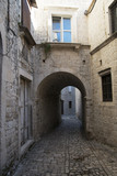 Fototapeta Uliczki - Pavement end narrow streets and courtyards  of Trogir,Croatia