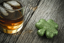 Glass Of Whiskey And Clovers To Celebrate St Patrick's Day