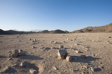 Rocky Desert Landscape With Mountains