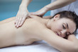 © Denizo - Young woman getting a massage in a spa