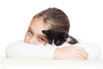 Canvas Print - kid tenderly embraces kitten