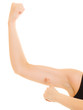 © Voyagerix - Fitness woman showing energy flexing biceps muscles.
