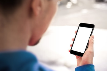 Man using mobile smartphone, blank screen.