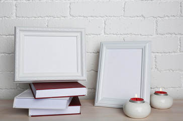 Wall Mural - Photo frames with candles and books