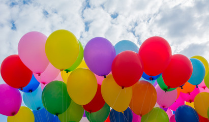 A colorful flying balloon in blue sky