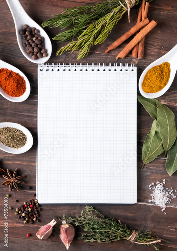Fotografía Fresh herbs, different spices notebook on the table