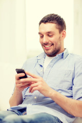 Sticker - smiling man with smartphone at home