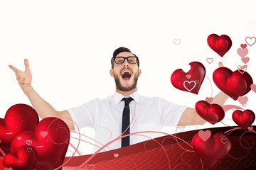 Leinwandbilder - Composite image of geeky young businessman with arms out