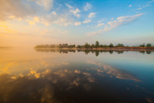 Clouds Reflecting In The Lake, Ukraine.