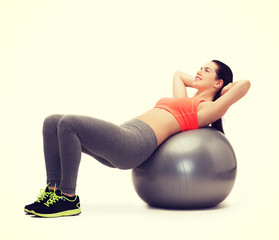 Canvas Print - teenage girl doing exercise on fitness ball