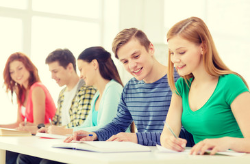 Poster - students with textbooks and books at school