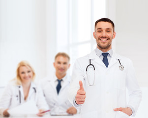 Sticker - smiling doctor with stethoscope showing thumbs up