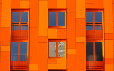 orange, modern apparment building.