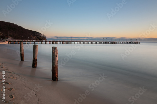 Naklejka nad blat kuchenny Beautiful colorful Sunrise on the pier at the seaside