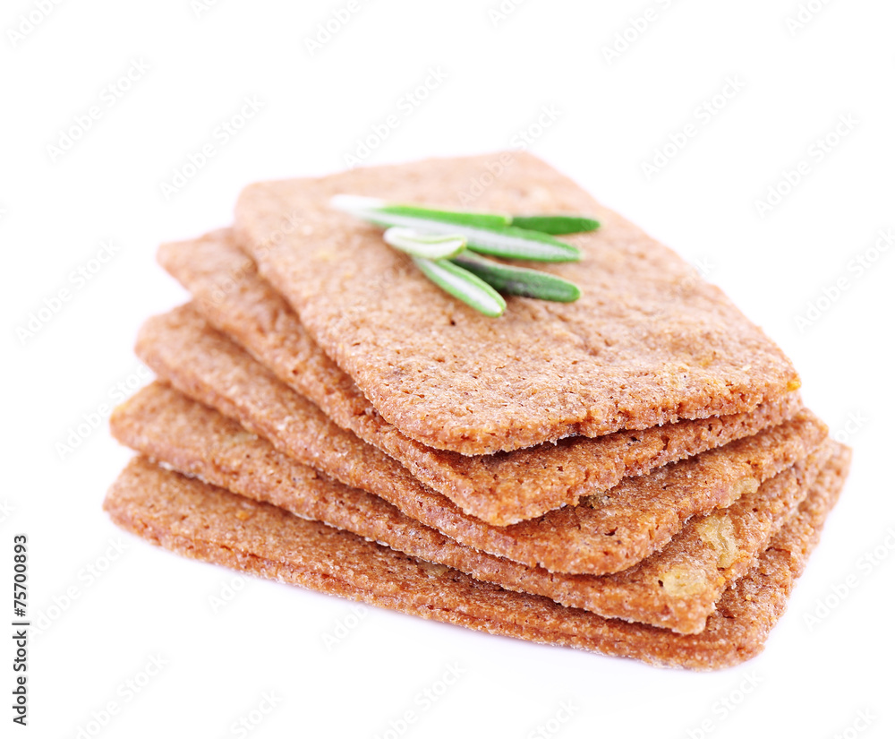 Crispbread with sprigs of rosemary isolated on white background