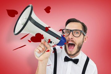 Leinwandbilder - Composite image of geeky businessman shouting through megaphone