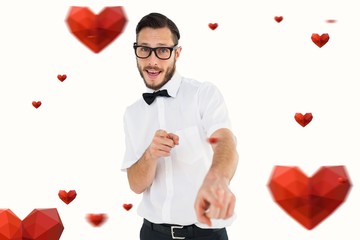 Poster - Composite image of geeky hipster pointing at camera