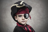 child pirate costume and background