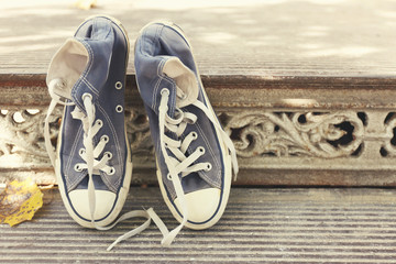 Pair of sneakers on floor