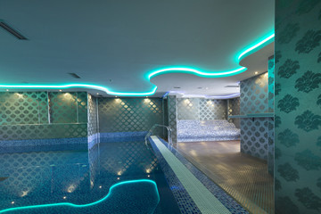 Swimming pool in luxury hotel spa center 