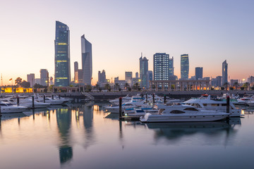 Fototapete - Souk Sharq Marina and Kuwait City at dusk