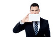 © stockyimages - Entrepreneur positively holds blank card