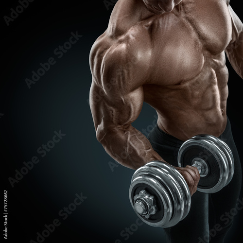 Tapeta ścienna na wymiar Strong and power bodybuilder doing exercises with dumbbell