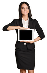 Wall Mural - Business woman holds in hands mobile tablet.