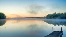 Toddy Pond, Maine With Mist And Wharf