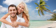 © Syda Productions - happy couple having fun over beach background