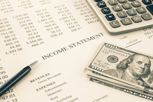 Money And Income Statement Report In Sepia Tone