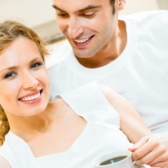 Canvas Print - Cheerful couple with coffee