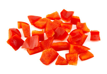 Chopped red pepper on white background.