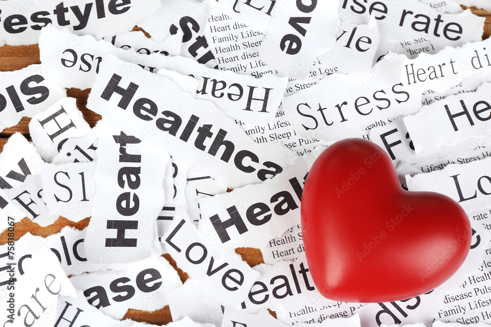 Decorative heart on background of paper notes