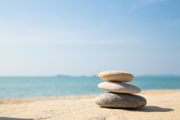 stones balance, pebbles stack on sea sand beach