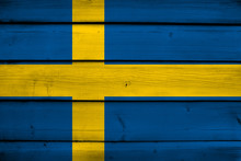 Sweden Flag On Wood Background