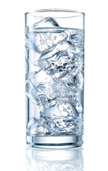 Glass of mineral carbonated water with ice