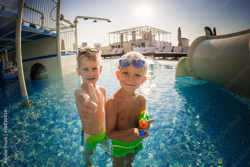 Two Boys Having fun at the Pool. Summer Vacation Fun. Stock Photo ...
