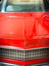 Close Up Detail Of Shiny Red Classic Car.