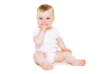 cute baby sitting on a white background