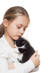 Wall Mural - child hugging a kitten