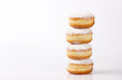 tower of doughnut on white background