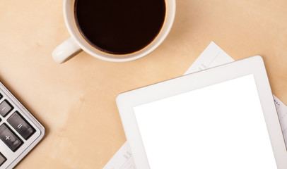 Wall Mural - tablet pc with empty space and a cup of coffee on a desk