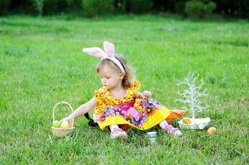 Adorable toddler girl wearing bunny ears