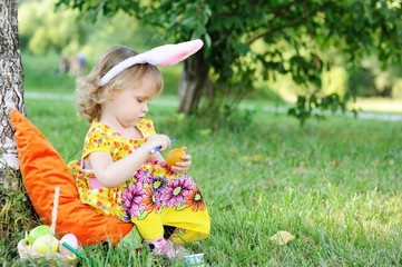 Adorable toddler girl wearing bunny ears