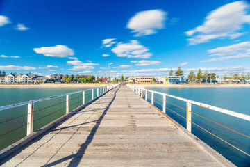 Wall Mural - Long exposure shot of jetty in a beach